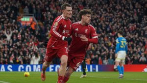 Liverpool's Florian Wirtz, left, celebrates with Liverpool's Milos Kerkez after scoring his side's second goal during the English Premier League soccer match between Liverpool and Wolverhampton Wanderers in Liverpool, Sunday, Dec. 27, 2025. (Ian Hodgson/AP)
