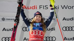 United States' Mikaela Shiffrin celebrates on the podium after winning an alpine ski, women's World Cup slalom, in Courchevel, France, Tuesday, Dec. 16, 2025. (Giovanni Auletta/AP)