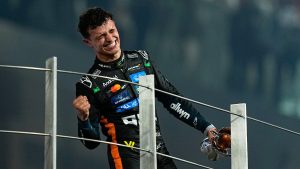 McLaren driver Lando Norris of Britain celebrates after becoming a world champion after the Formula One Abu Dhabi Grand Prix at the Yas Marina Circuit in Abu Dhabi, UAE, Sunday, Dec. 7, 2025. (Fatima Shbair/AP)