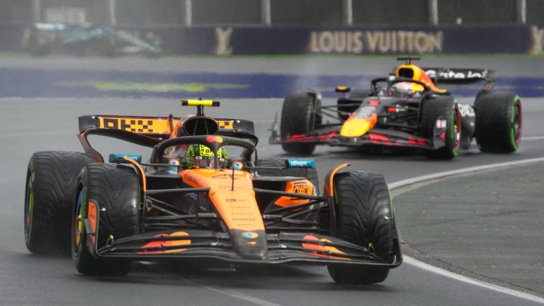 McLaren driver Lando Norris of Britain leads Red Bull driver Max Verstappen of the Netherlands during the Australian Formula One Grand Prix at Albert Park, in Melbourne, Australia, Sunday, March 16, 2025. (Scott Barbour/AP)