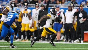 Pittsburgh Steelers' Jaylen Warren runs for a touchdown during the second half of an NFL football game against the Detroit Lions, Sunday, Dec. 21, 2025, in Detroit. (Ryan Sun/AP)