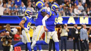 Los Angeles Rams quarterback Matthew Stafford (9) smiles after throwing a touchdown pass to tight end Colby Parkinson (84) during the second half of an NFL football game against the Detroit Lions, Sunday, Dec. 14, 2025, in Inglewood, Calif. (Katie Chin/AP)