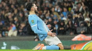 Manchester City's Rayan Cherki celebrates after scoring his side's first goal during the English League Cup soccer match between Manchester City and Brentford in Manchester, England, Wednesday, Dec. 17, 2025. (Jon Super/AP)