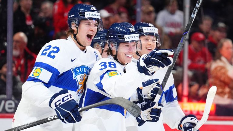 Finland forward Jesse Kiiskinen (38) celebrates his goal against the USA with teammates Kasper Halttunen (22) and Konsta Helenius (19) during second period IIHF World Junior Hockey Championship tournament action in Ottawa on Sunday, Dec. 29, 2024. (Sean Kilpatrick/CP)