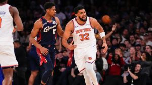 New York Knicks centre Karl-Anthony Towns (32) reacts after scoring during the first half of an NBA basketball game against the Cleveland Cavaliers, Thursday, Dec. 25, 2025, in New York. (Yuki Iwamura/AP Photo)
