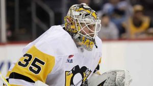 Pittsburgh Penguins goaltender Tristan Jarry defends his net in the second period of an NHL hockey game against the New Jersey Devils.