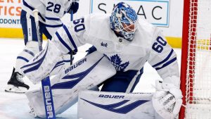 Toronto Maple Leafs goaltender Joseph Woll (60) watches the puck against the Carolina Hurricanes during the second period of an NHL hockey game in Raleigh, N.C., Thursday, Dec. 4, 2025. (Karl DeBlaker/AP)