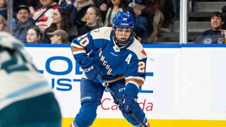 Vancouver Goldeneyes' Sarah Nurse (20) skates with the puck during the first period of a PWHL hockey game in Vancouver, on Friday, November 21, 2025. (Ethan Cairns/CP)