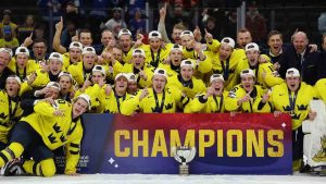 Sweden players celebrate after winning an IIHF World Junior Hockey Championship gold medal game against Czechia, Monday, Jan. 5, 2026, in St. Paul, Minn. (Matt Krohn/AP)