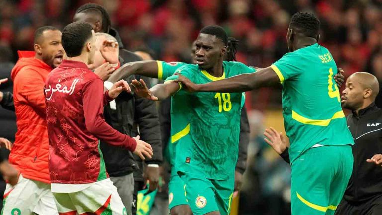 Senegal's and Morocco[s players scuffle after a penalty call during the Africa Cup of Nations final soccer match between Senegal and Morocco, in Rabat, Morocco, Sunday, Jan. 18, 2026. (Mosa'ab Elshamy/AP)