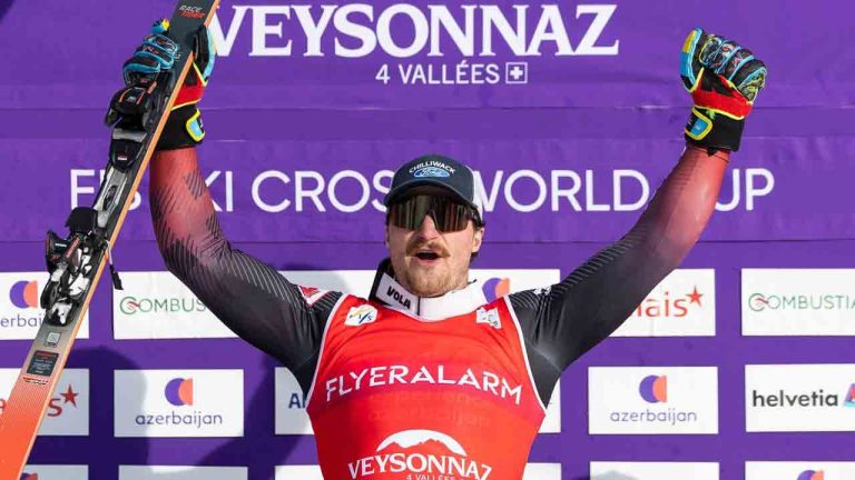 The winner Reece Howden of Canada celebrates during the podium ceremony of the men's Ski Cross event at the FIS Ski Cross, SX, World Cup, in Veysonnaz, Switzerland Saturday, Jan. 24, 2026. (Cyril Zingaro/Keystone via AP)