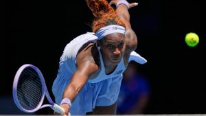 Coco Gauff of the U.S. plays a backhand return to Kamilla Rakhimova of Uzbekistan during their first round match at the Australian Open tennis championship in Melbourne, Australia, Monday, Jan. 19, 2026. (Aaron Favila/AP)
