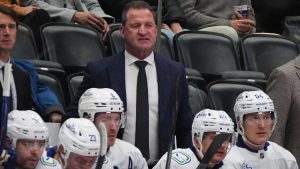 Vancouver Canucks head coach Adam Foote in the second period of an NHL hockey game Tuesday, Dec. 2, 2025, in Denver. (David Zalubowski/AP)