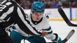 San Jose Sharks centre Macklin Celebrini lines up for a faceoff in the second period of a regular-season game against the Avalanche in Nov. 2025. (Photo by David Zalubowski/AP)