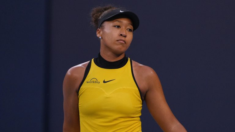 Naomi Osaka reacts after losing a point to Aliaksandra Sasnovich during the women's singles match for the China Open tournament, at the National Tennis Center, in Beijing, Saturday, Sept. 27, 2025. (Andy Wong/AP)