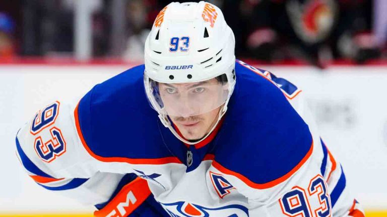 Edmonton Oilers' Ryan Nugent-Hopkins (93) keeps his eye on the face-off during first period NHL action against the Ottawa Senators, in Ottawa on Tuesday, Oct. 21, 2025. (Sean Kilpatrick/CP)