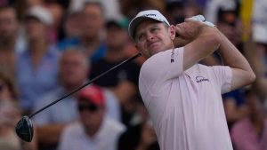 Justin Rose of England hits off the first tee during the final round of World Tour Golf Championship in Dubai, United Arab Emirates, Sunday, Nov. 16, 2025. (Altaf Qadri/AP)