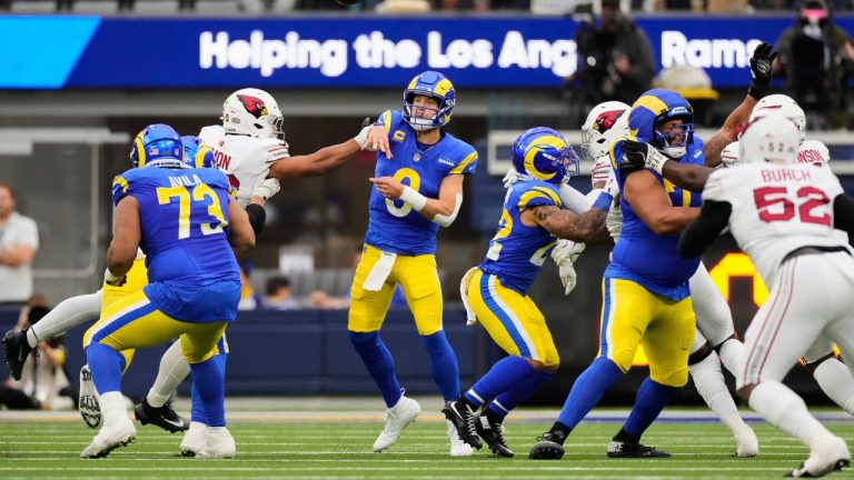 Los Angeles Rams quarterback Matthew Stafford (9) passes the ball during the first half of an NFL football game against the Arizona Cardinals, Sunday, Jan. 4, 2026, in Inglewood, Calif. (AP Photo/Mark J. Terrill)