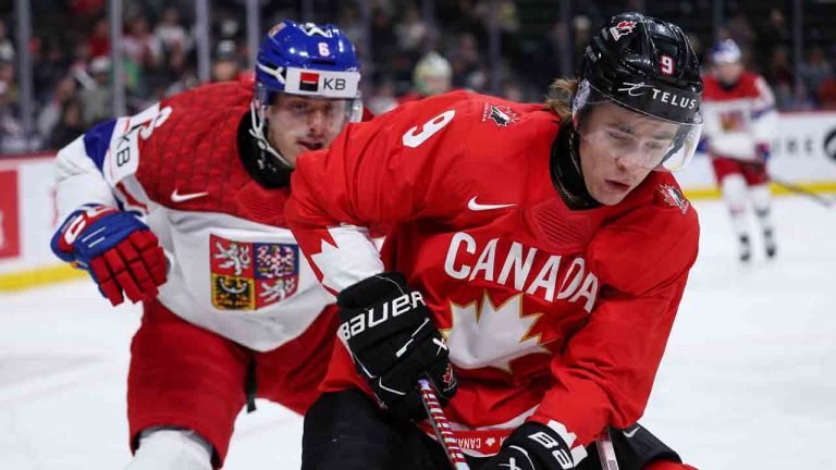 Canada forward Gavin McKenna, right, skates with the puck as Czechia defense Radim Mrtka defends during the second period of an IIHF World Junior Hockey Championship semifinals game, Sunday, Jan. 4, 2026, in St. Paul, Minn. (Matt Krohn/AP)