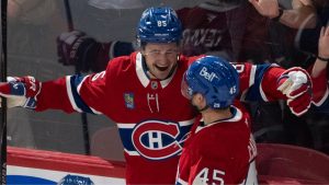 Montreal Canadiens' Alexandre Texier celebrates his hat trick against the Florida Panthers with Alexandre Carrier during third period NHL action in Montreal on Thursday, Jan. 8, 2026. (Christinne Muschi/CP)