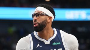 Dallas Mavericks forward Anthony Davis (3) works the floor during an NBA basketball game between the Dallas Mavericks and the Philadelphia 76ers Thursday, Jan. 1, 2026, in Dallas. (AP Photo/Julio Cortez)