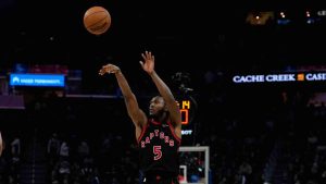 Toronto Raptors guard Immanuel Quickley (5) shoots a 3-point basket in front of Golden State Warriors guard Moses Moody (4) during the second half of an NBA basketball game, Tuesday, Jan. 20, 2026, in San Francisco. (Godofredo A. Vásquez/AP)