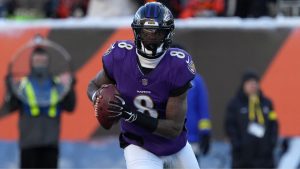 Baltimore Ravens quarterback Lamar Jackson runs out of the pocket during an NFL game against the Cincinnati Bengals, Sunday, Dec. 14, 2025, in Cincinnati. (Kareem Elgazzar/AP)
