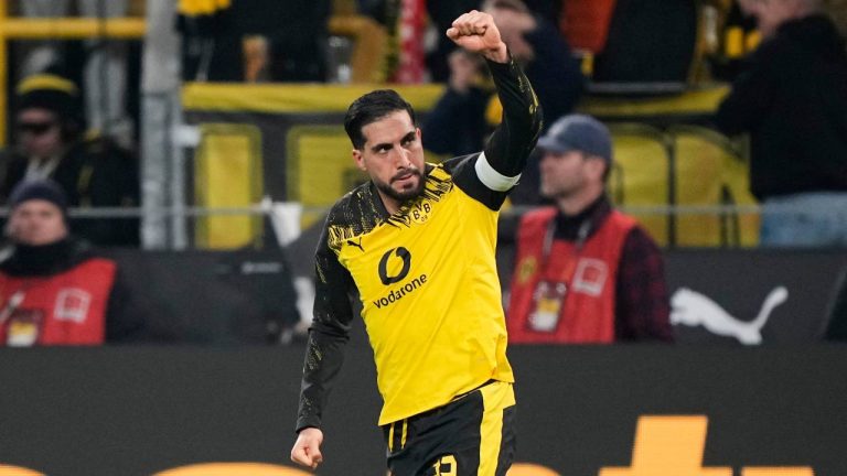 Dortmund's Emre Can celebrates after he scored his side's decisive third goal from the penalty spot during the German Bundesliga soccer match between Borussia Dortmund and St. Pauli in Dortmund, Germany, Saturday, Jan. 17, 2026. (Martin Meissner/AP)