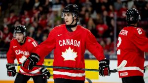 Canada's Michael Misa (7), Tij Iginla (11) and Kashawn Aitcheson (2) look on during first period IIHF World Junior Championship quarterfinal hockey action against Slovakia, in Minneapolis, Minn., on Friday, January 2, 2026. (Christopher Katsarov/CP)