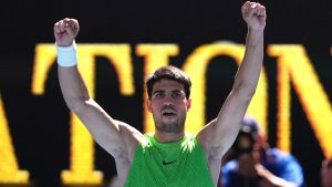 Carlos Alcaraz of Spain reacts after defeating Corentin Moutet of France in their third round match at the Australian Open tennis championship in Melbourne, Australia, Friday, Jan. 23, 2026. (Asanka Brendon Ratnayake/AP)