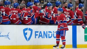Montreal Canadiens right wing Cole Caufield (13) celebrates during the second period after his third goal of an NHL hockey game against the Boston Bruins in Boston, Saturday, Jan. 24, 2026. (Robert F. Bukaty/AP)