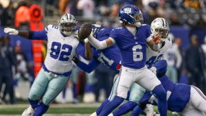 New York Giants quarterback Jaxson Dart (6) passes the ball against the Dallas Cowboys during the first quarter of an NFL football game, Sunday, Jan. 4, 2026, in East Rutherford, N.J. (Adam Hunger/AP)