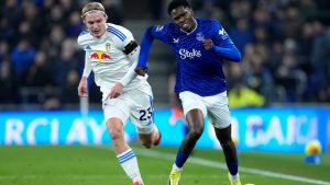 Leeds United's Sebastiaan Bornauw, left, and Everton's Thierno Barry in action during the English Premier League soccer match between Everton and Leeds United in Liverpool, England, Monday Jan. 26, 2026. (Peter Byrne/PA via AP)