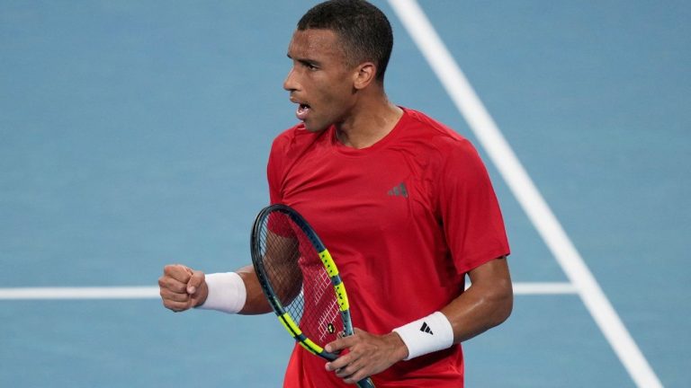 Felix Auger-Aliassime of Canada celebrates winning the first set against Zhizhen Zhang of China during their match at the United Cup tennis tournament in Sydney, Sunday, Jan. 4, 2026. (AP/Rick Rycroft)