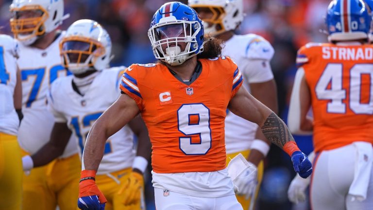 Denver Broncos safety Talanoa Hufanga reacts after tackling Los Angeles Chargers quarterback Trey Lance (not shown) during the first half of an NFL game Sunday, Jan. 4, 2026, in Denver. (AP/David Zalubowski)