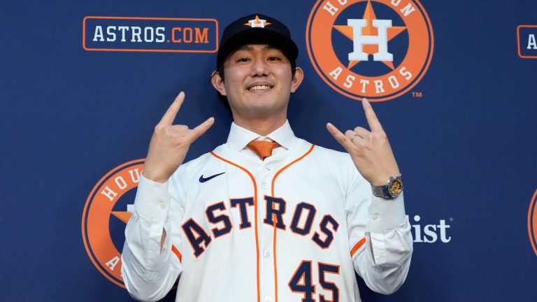 Tatsuya Imai, a right-handed pitcher from Japan, poses for photos after a press conference in Houston, Monday, Jan. 5, 2026, after signing a contract with the Houston Astros. (Ashley Landis/AP)