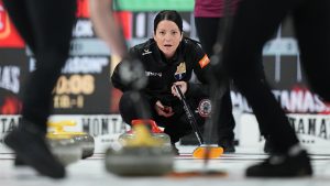 Kerri Einarson watches a stone from the house during Canadian Olympic trials semifinal action against Team Black on Nov. 27, 2025. (Photo by Darren Calabrese/CP)