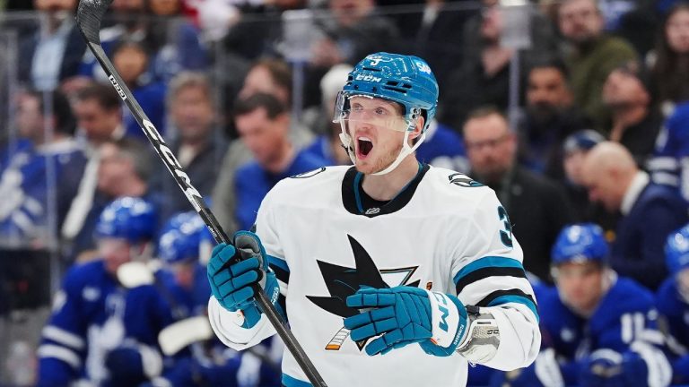 San Jose Sharks' John Klingberg (3) celebrates his goal against the Toronto Maple Leafs during third period NHL hockey action in Toronto on Thursday, Dec. 11, 2025. (Frank Gunn/CP)