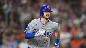 Chicago Cubs' Kyle Tucker runs up the first base line against the Houston Astros during the first inning of a baseball game Sunday, June 29, 2025, in Houston. (AP Photo/David J. Phillip)