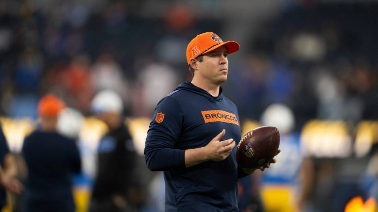 Denver Broncos defensive backs coach Jim Leonhard walks on the field before an NFL football game against the Los Angeles Chargers, Thursday, Dec. 19, 2024, in Anaheim, Calif. (Kyusung Gong/AP)