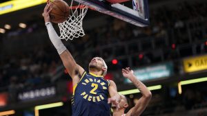 Indiana Pacers guard Andrew Nembhard, left, shoots in front of Atlanta Hawks forward Zaccharie Risacher during the first half of an NBA game in Indianapolis, Saturday, Jan. 31, 2026. (AP/AJ Mast)