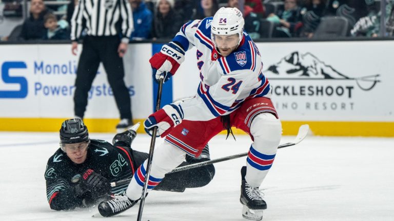 New York Rangers defenseman Carson Soucy (24) skates against Seattle Kraken forward Kaapo Kakko during the first period of an NHL hockey game, Saturday, Nov. 1, 2025, in Seattle. (Stephen Brashear/AP)