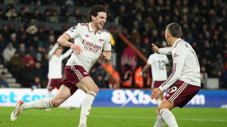 Arsenal's Declan Rice, left, celebrates with Arsenal's Leandro Trossard after scoring his sides third goal during the English Premier League soccer match between Bournemouth and Arsenal in Bournemouth, England, Saturday, Jan. 3, 2026. (Alastair Grant/AP)