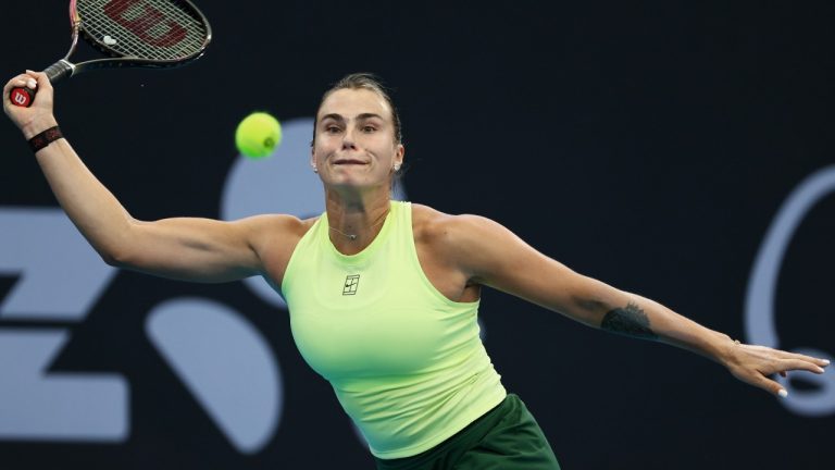 Aryna Sabalenka of Belarus plays a shot during her semifinal tennis match against Karolína Muchova of the Czech Republic at the Brisbane International in Brisbane, Australia, Saturday, Jan. 10, 2026. (AP Photo/Tertius Pickard)
