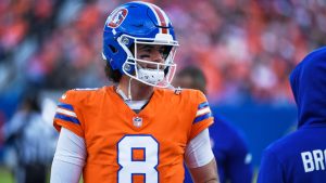 Denver Broncos quarterback Jarrett Stidham (8) in the first half of an NFL football game Sunday, Jan. 4, 2026, in Denver. (Eric Lutzens/AP)