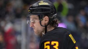 Vancouver Canucks' Teddy Blueger prepares to take a faceoff during the third period of an NHL hockey game against the Washington Capitals, in Vancouver, on Wednesday, January 21, 2026. (Darryl Dyck/CP)