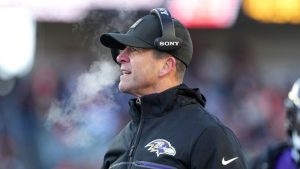 Former Baltimore Ravens head coach John Harbaugh talks to an official during an NFL game, Sunday, Dec. 14, 2025, in Cincinnati. (Kareem Elgazzar/AP)