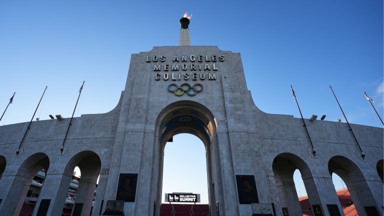 The Olympic cauldron is lit at the Los Angeles Memorial Coliseum ahead of the launch for ticket registration to the 2028 Summer Olympic Games Tuesday, Jan. 13, 2026, in Los Angeles. (Damian Dovarganes/AP)