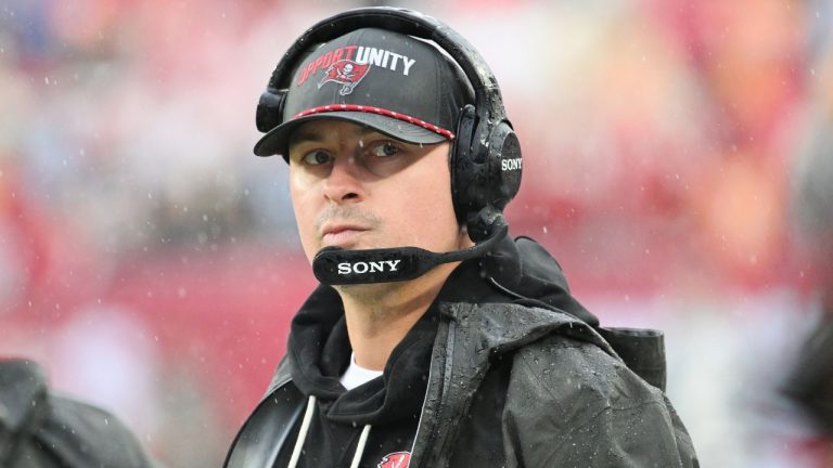 Tampa Bay Buccaneers offensive coordinator Josh Grizzard watches from the sideline during an NFL football game against the Carolina Panthers Saturday, Jan. 3, 2026, in Tampa, Fla. (Jason Behnken/AP)