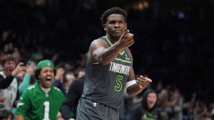 Minnesota Timberwolves guard Anthony Edwards reacts after making a basket during the second half of an NBA basketball game against the San Antonio Spurs, Sunday, Jan. 11, 2026, in Minneapolis. (Abbie Parr/AP)